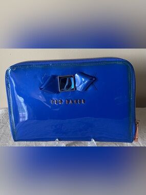 “Ted Baker London” Patent Leather Clutch/Wallet NWOT
On Sale Now!
